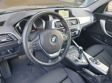 BMW 1-serie 118i Corporate Lease Executive PDC/NAVI/CRUISE/CLIMA/LMV